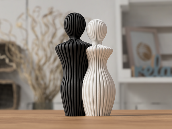 Couple Statues - Noéra Interiors